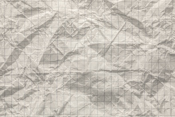 gros plan d’une composition graphiée ou d’un papier de cahier d’exercices avec une texture rugueuse et froissée - graph paper mesh paper book photos et images de collection