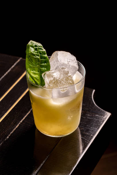 istock Luxury cocktail on the wooden table on a dark background 1951739084
