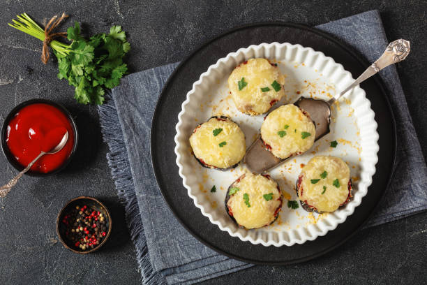 istock mini eggplant pizzas with tomato sauce and cheese 1951744154