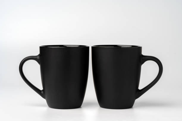 istock Black coffee mugs mock up on white background copy space 1951769579