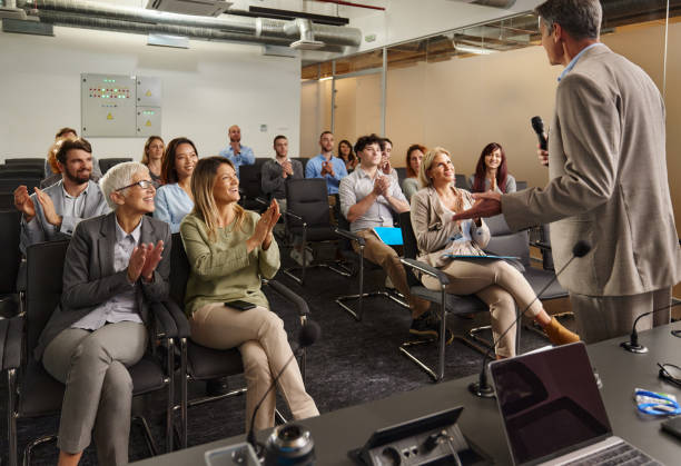 istock Applauding on successful seminar in board room! 1951803219