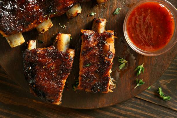 istock Barbecue pork ribs on cutting board 1951836782