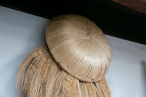 Japanese sandals, cape and hat handmade from straw from the countryside of the Niigata region in northern Japan..