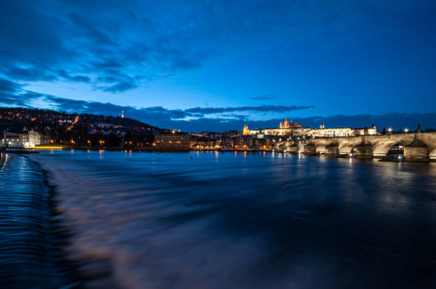 istock Prague city by the water at night 1951886168