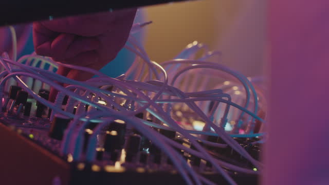 DJ Performing on Modular Synthesizer