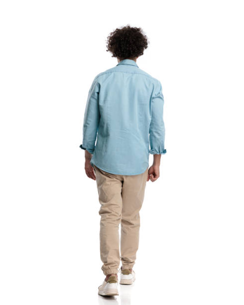 istock behind of young casual man stepping 1951909560