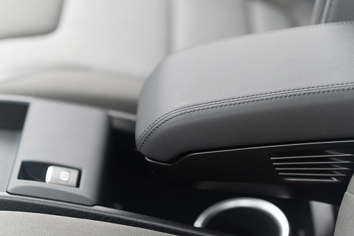 Car center armrest, gray, leather, close-up