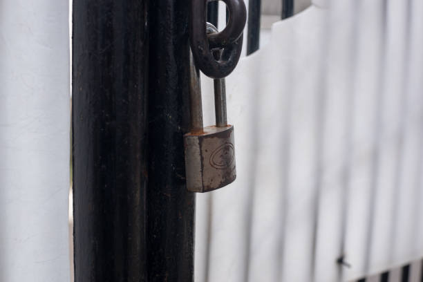 istock rusty house fence padlock. Old rusty Padlocks. Rusty door latch padlock 1952004546