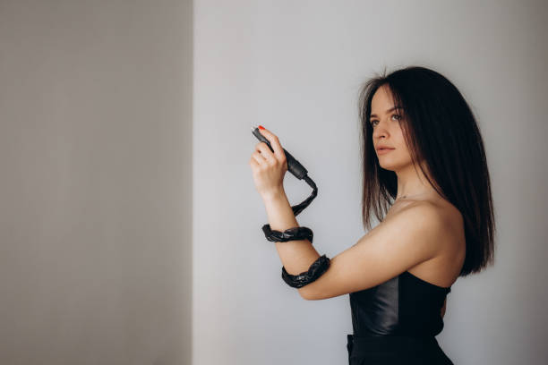 Manicurist in working form with tools in hand. Nail photo content.