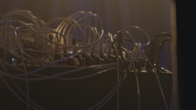 Multiple Wires Plugged into Modular Synthesizer