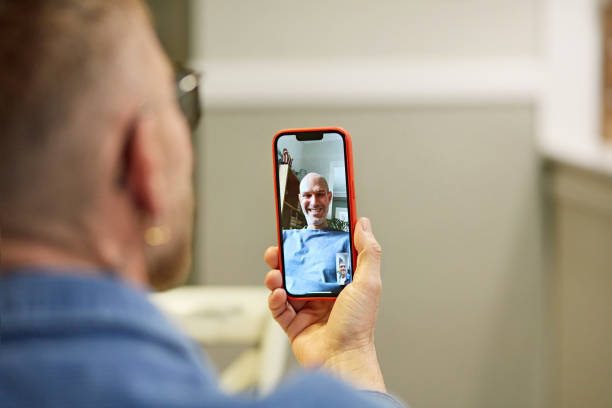 istock Gay men communicating on smart phone 1952026370