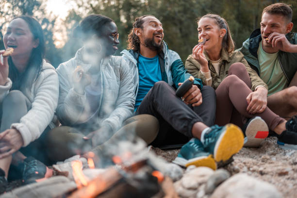 istock Beautiful Diverse Group Celebrating by the Bonfire 1952027208