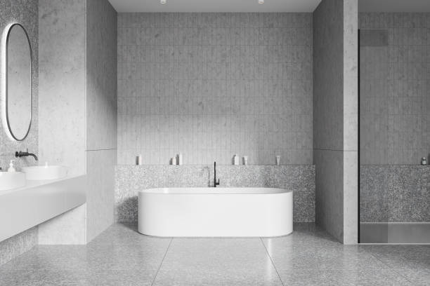 istock White bathroom with tub, sink and shower 1952107178
