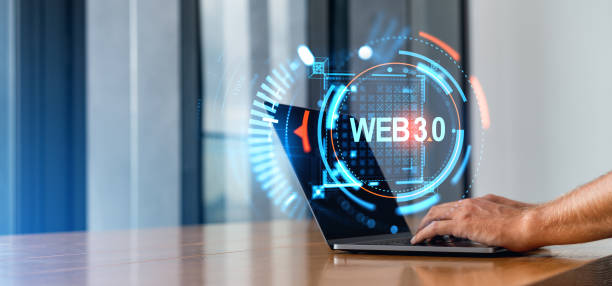 istock Man hands working with laptop, glowing web 3.0 hologram hud 1952111460