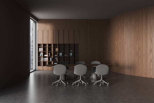 istock Gray and wooden board room interior with bookcase 1952113587