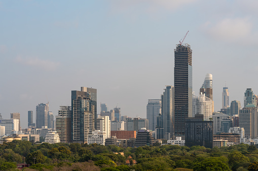 Bangkok cityscape panoramic view on Lumpini park and skyscrapers. Asian business city skyline, modern metropolis and corporate office building at daylight