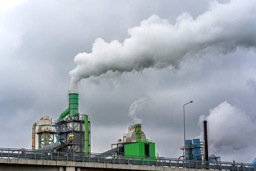 Factory polluting the environment with toxic fumes