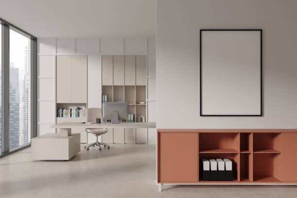 istock Stylish office room interior with desk and pc computer, drawer with mockup frame 1952128372