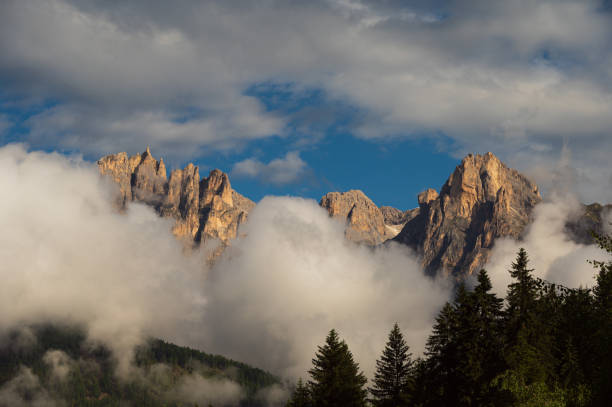 istock mount Catinaccio range with clouds, Dolomites, Italy 1952131083