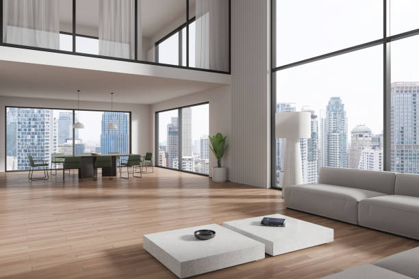 istock White living room and dining room interior 1952136393