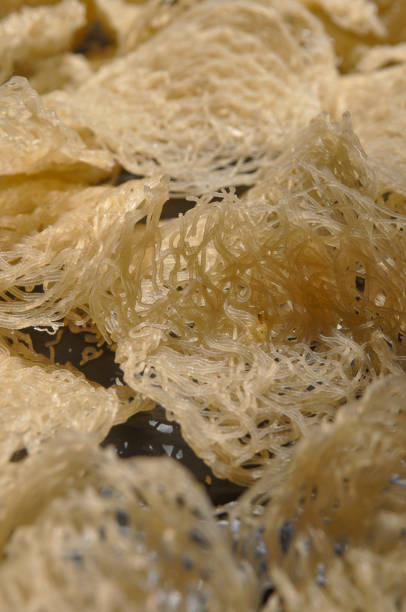 istock White round raw dried string hopper rice noodle asian food background image 1952157817