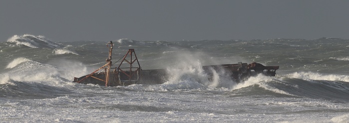 Shipwreck in stormy sea