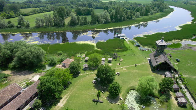 Aerial view of nature reserve Zasavica, Serbia with souvenir shop near lake