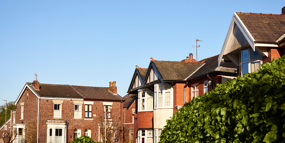 A row of houses on a street in Northwest England.