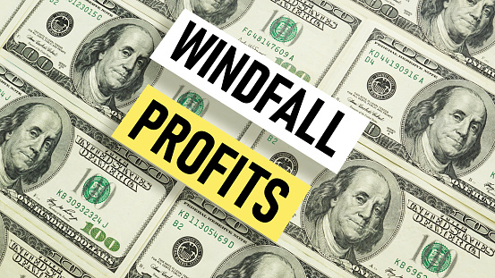 Windfall profits is shown using a text and photo of calculator