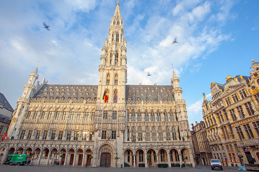 Brussels, Belgium - June 05, 2022: Panorama of The Grand Place in Brussels on the main square f, the World Heritage Site by UNESCO, taken early morning