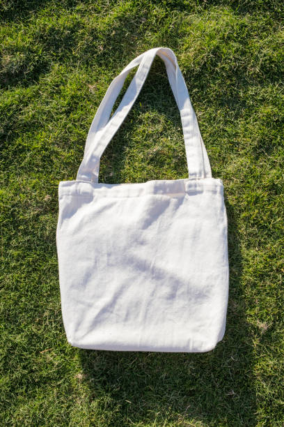 istock Mockup shopper handbag on green grass background 1952201770