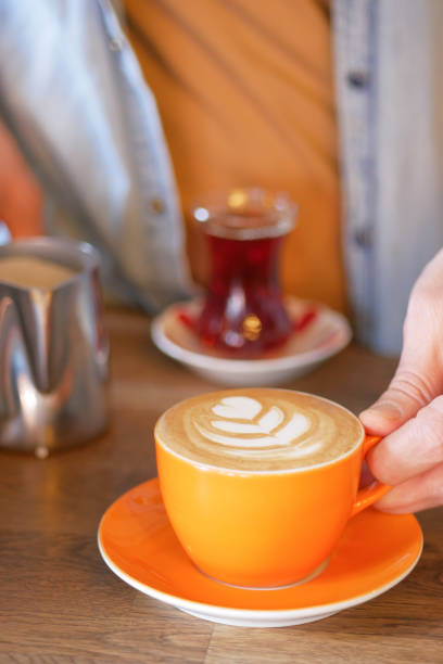 istock Waitress offering a cup of coffee. 1952247111