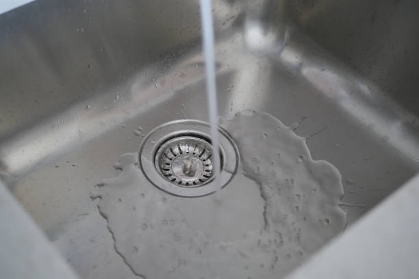 istock water pouring from a faucet tap slow motion 1952256594
