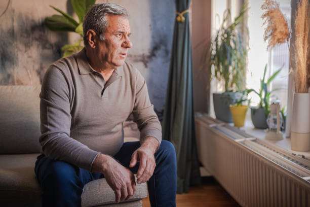 istock Lonely man, alone at home 1952264439