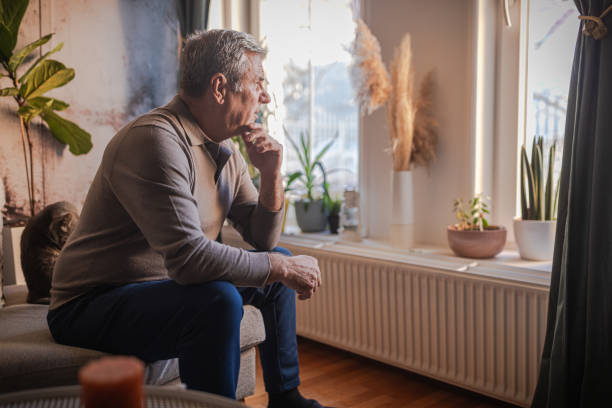 istock Lonely man, alone at home 1952264969