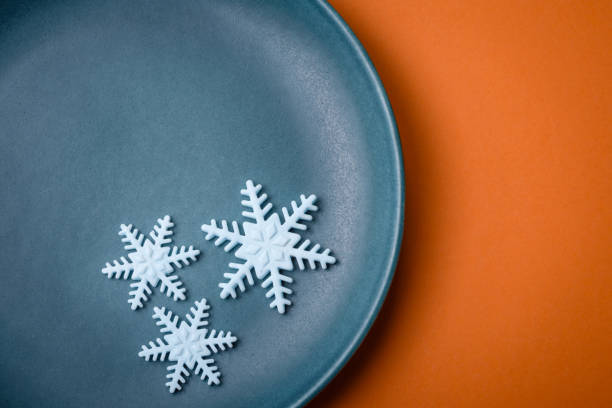 istock Beautiful winter snowflakes on a plain background with copy space 1952265499