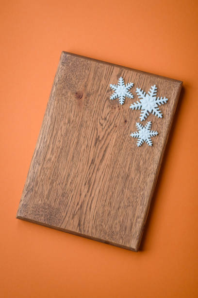 Beautiful winter snowflakes on a plain background with copy space. Winter background for your design