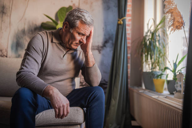 istock Stressed, unhappy man with severe headache 1952266015