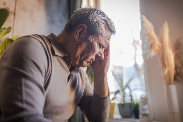 istock Stressed, unhappy man with severe headache 1952266543