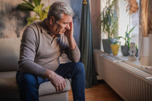istock Stressed, unhappy man with severe headache 1952266546
