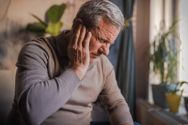 istock Stressed, unhappy man with severe earache 1952267056