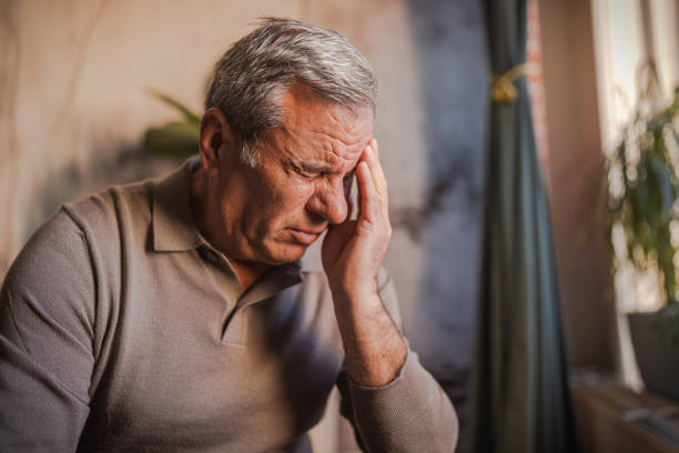 istock Stressed, unhappy man with severe headache 1952267594