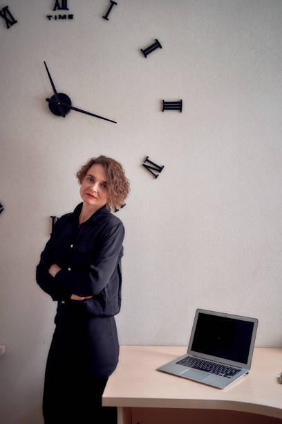 istock woman with laptop work in office 1952309441