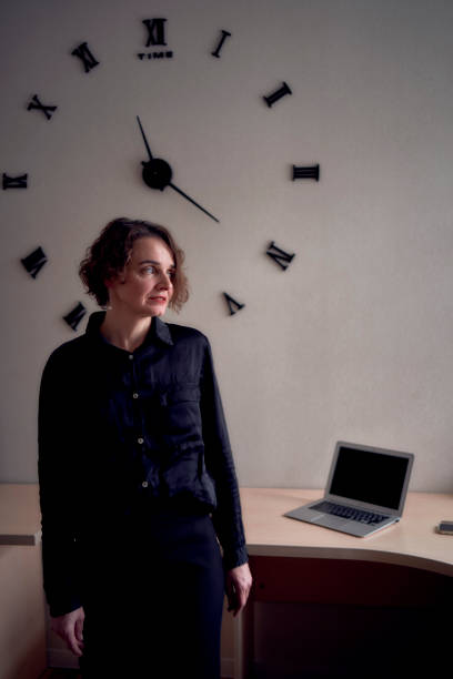 istock woman with laptop work in office 1952310760