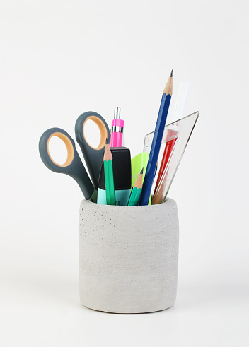 School supplies in concrete pencil container,Back to school Concept