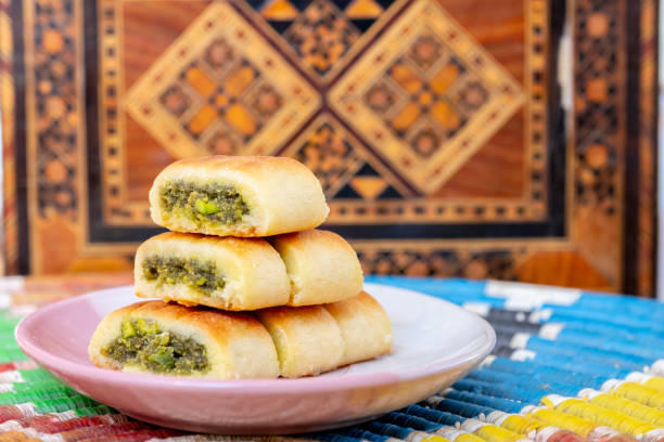 istock Arabic sweets, maamoul and coffee on traditional background 1952324835