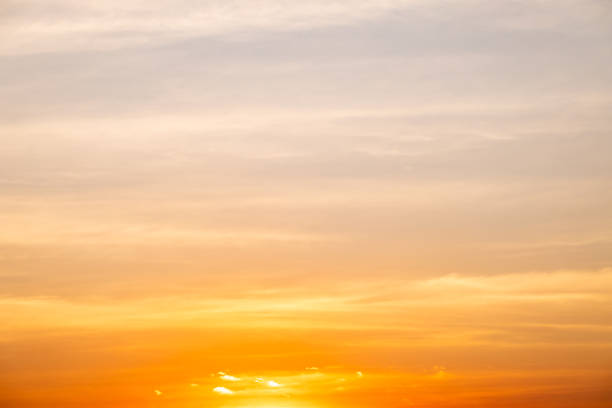 istock Beautiful , luxury soft gradient orange gold clouds and sunlight on the blue sky perfect for the background, take in everning,Twilight, Large size, high definition landscape photo 1952328083