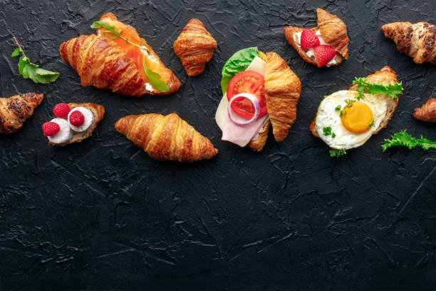 croissant sandwich assortment. various stuffed croissants, overhead - fried egg lettuce vegetable lunch photos et images de collection