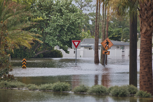 A street covered with storm surge by Hurricane Idalia in Shore Acres, a neighborhood in St. Petersburg, Florida