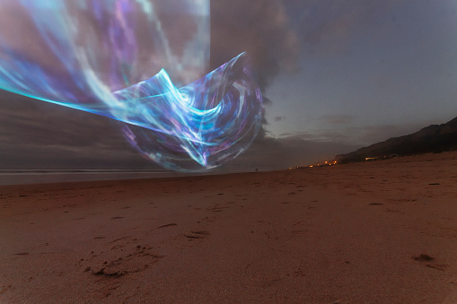 Lightpaint photo at a beach in the Setúbal district, South of Portugal.